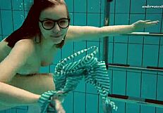 dasha submerged underwater in bikini and naked on beach