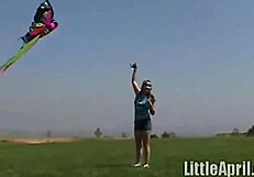 hey, that teen april is rubbing her clit outdoors while sucking on a popsicle, feeling so naughty with her brunette babe vibes