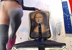 skinny fit redhead uses black dildo and cums hard