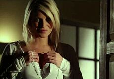 European babe performs a gentle striptease