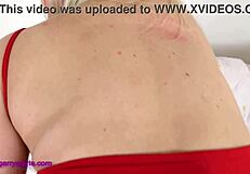 Tracey in Fishnets and Red Dress Gets Anal Insertion on Desk