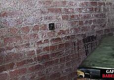 dominant woman uses toys on submissive partner