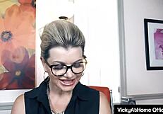 Big boobed Vicky Vette rubs muff at boring office