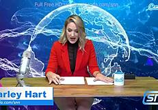 camsoda features a hot milf riding sybian and masturbating while reading live news.