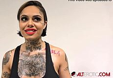 Busty Tattooed Brunette Genevieve Sinn Shares Backstage Interview Details About Her Erotic Ass And Big Tits.