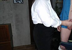 Is the slutty secretary jerking her boss's big cock at work?