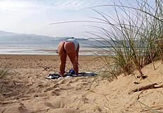 i filmed curvy milf changing and exercising on beach