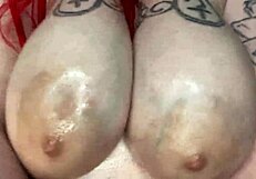 Sexy BBW Massaging Big Tits with Oil in Homemade Clip