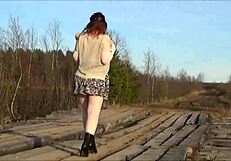 My sexy hairless wife walks without panties in heels and skirt, showing big tits and ass