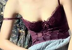 Asian Girl in Sexy Uniform Uses Vibrator on Pussy and Tits