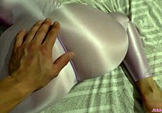 babe in sexy nylon gives cock handjob