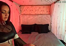 Mature redhead wife plays masturbation game by candlelight.