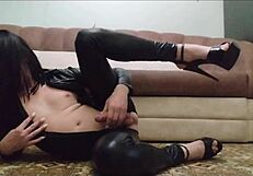 jenna bella shows off her shaved big cock while playing with toys. her hairless transsexual body teases in solo masturbation.