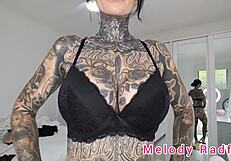 melody radford tries on black lingerie.