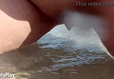 Shaved pussy peeing wildly on public beach!