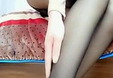 chinese asian goddess in high heels and black stockings homemade video