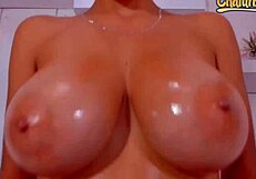 Spit and oil on perfect big tits