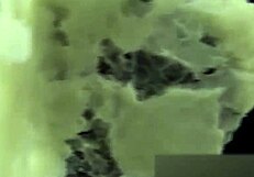 Asian Woman Stomps Noodles In Shoes