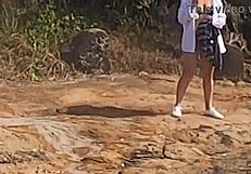 Stunning young African caught having outdoor sex on beach rocks