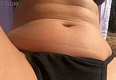 Stunning young African caught having outdoor sex on beach rocks