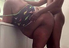 Ebony babe enjoys a quick hardcore fuck in the bathroom with monster cock