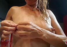 hot mom pulling balloon through stretched nipple piercings