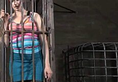 restrained woman undergoes punishment in a controlled setting