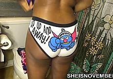 Pretty Ebony Girl Dresses Slowly in Bathroom