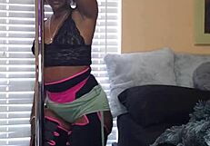 naej ae twerks her ass, grinding pussy on pole suggestively