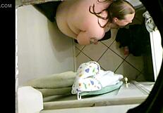 Hidden Cam Captures Friend's Wife with Big Tits in Action