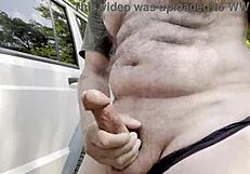 gay guy with big cock jerks off in the woods