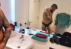 Dirty gay gets horny in the bathroom with a shower and a dildo