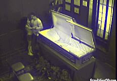 Couple caught on hidden cam banging hardcore in coffin