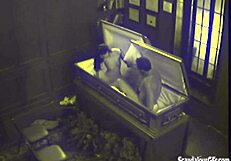 Couple caught on hidden cam banging hardcore in coffin