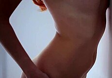 Redhead Babe Michelle Undresses Shaved Body Solo