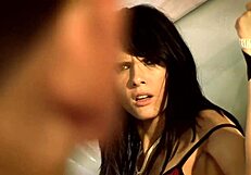 Tattooed babes tied up in truck fuck together.