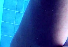 sexy chick swims naked in pool