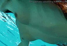 sexy chick swims naked in pool