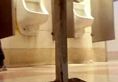 Intriguing gay sex encounter happening in the second toilet.