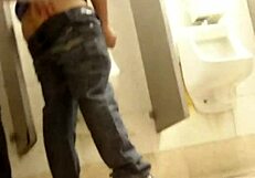 Intriguing gay sex encounter happening in the second toilet.