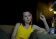 Brunette Sucks Cigarette While Watching Voyeur