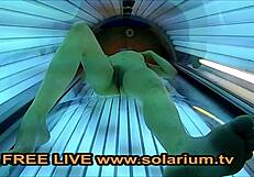 Holy! Blonde Teen 18+ Fingers Herself in Public Solarium Voyeur Cam