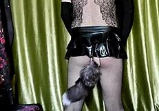 Is this cute ladyboy in latex moaning during solo play?