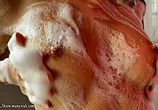 Lilu Moon masturbates wet pussy with big vibrator in bathroom