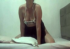 This perky ass prostitute is rubbing her pussy on a pillow in public.