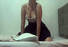 This perky ass prostitute is rubbing her pussy on a pillow in public.