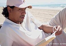 Boy Reads On Beach But She Surprises Him?