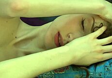 Flexible Ballerina Posing Nude on Black Leather Sofa in Sexy Display