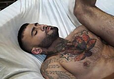 Latino with big dick gently breaks into sexy hairy ass in interracial gay couple.