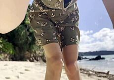 Pretty Babe Cleans Natural Beach at Pacific Ocean.